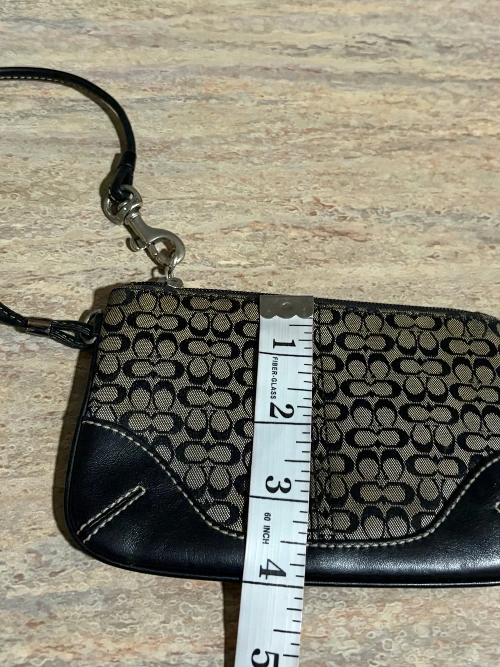 Coach Signature Canvas Wristlet with leather trim and handle
